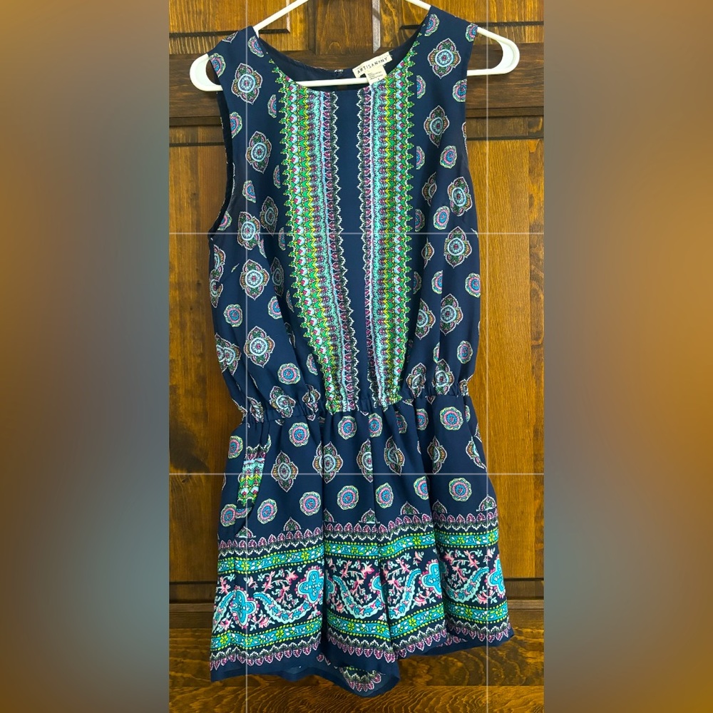 Colorful romper for spring, summer or fall! Great condition and nice material
